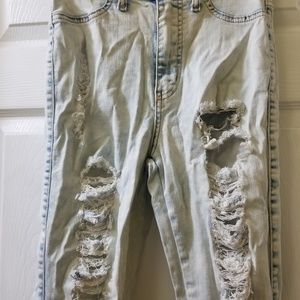 Very light blue denim distressed jeans
